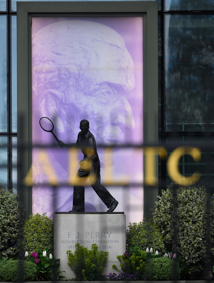 The Fred Perry statue is seen at Wimbledon as the spread of the coronavirus disease (COVID-19) continues (Reuters Photo)