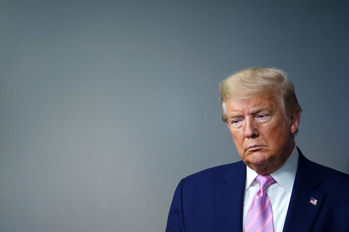 Donald Trump takes part in the daily briefing on the novel coronavirus at the White House. AFP