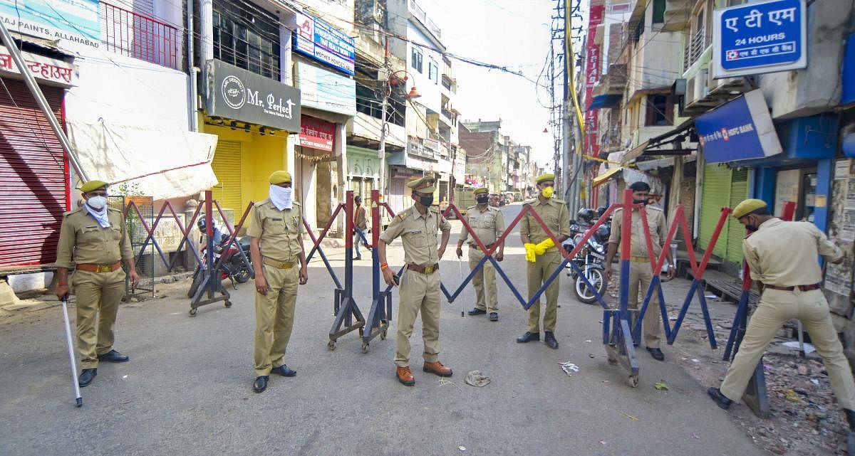 Police personnel during a search operation for devotees who had attended religious congregation at Delhi's Nizamuddin area, in Prayagraj. PTI
