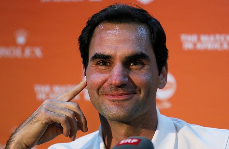 Roger Federer speaks during a media briefing at Cape Town International Airport ahead of his exhibition tennis match against Rafael Nadal, in Cape Town, South Africa. (Reuters Photo)