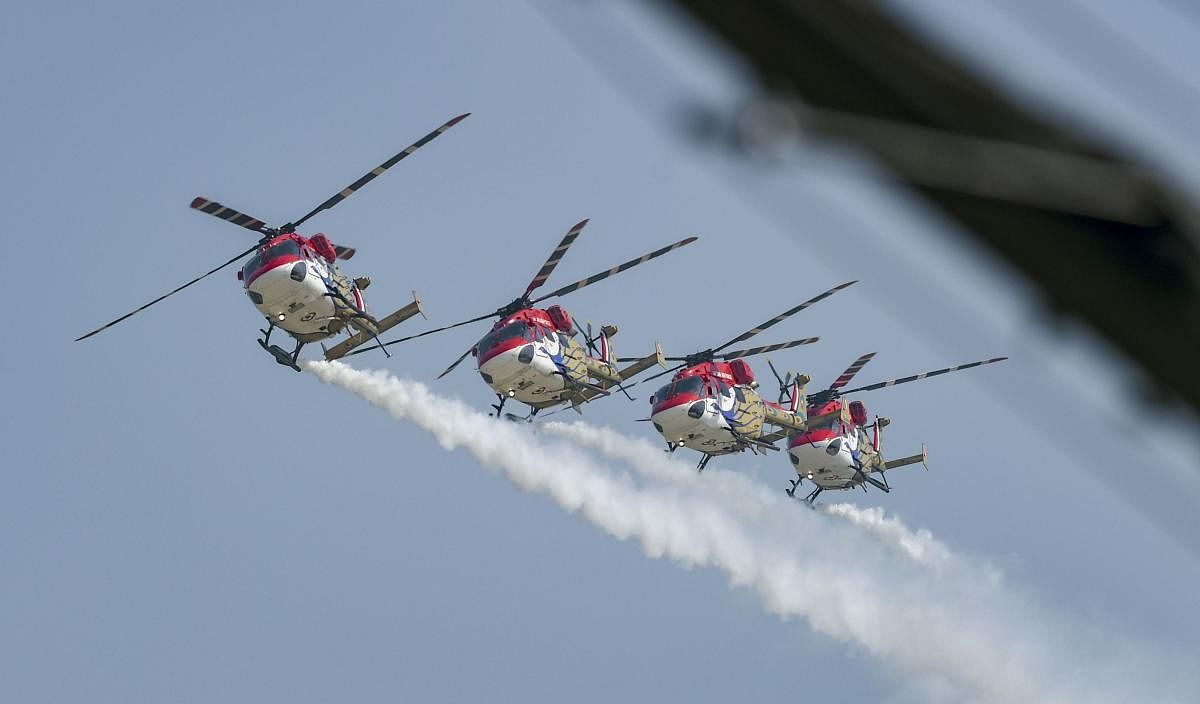 Indian Air Force's Sarang helicopters perform aerobatic stunts during rehearsals for the 87th Indian Air Force Day celebrations at Hindon Airbase, Ghaziabad. (PTI photo)