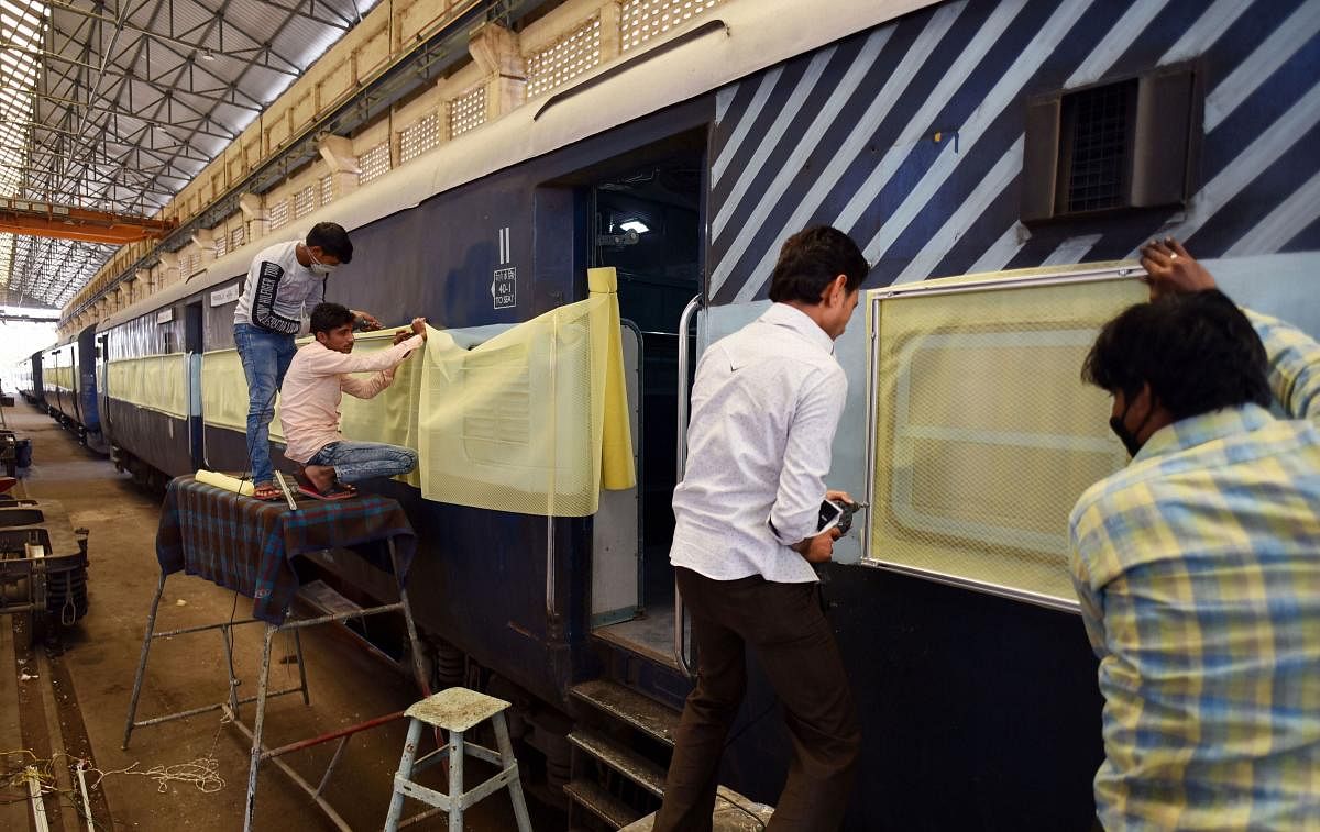  Workers prepare railway coaches to be used as isolation wards for COVID 19 patients (PTI Photo)