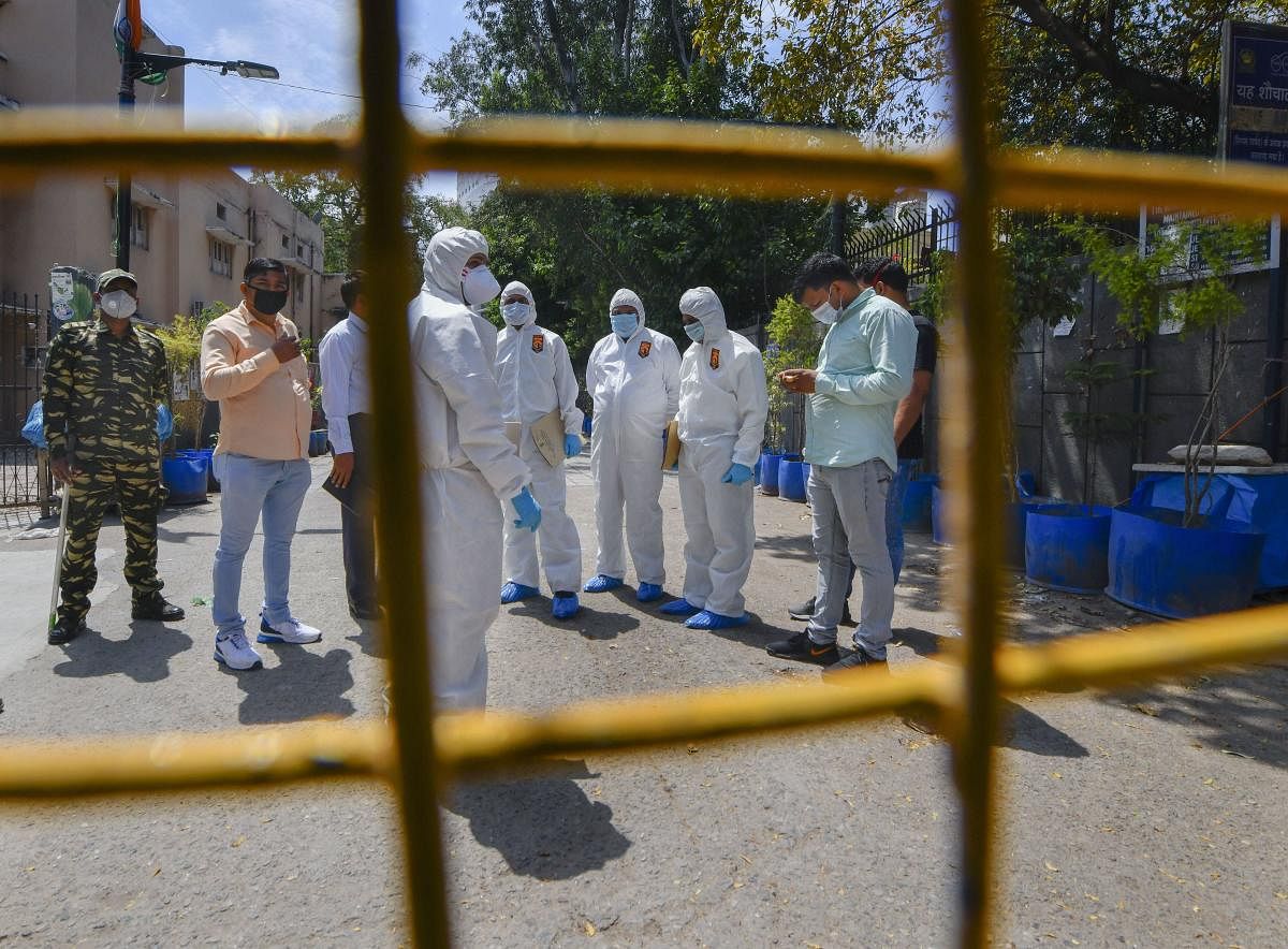 Forensic officials arrive at Nizamuddin Markaz to conduct an investigation, during the nationwide lockdown to curb the spread of coronavirus. PTI