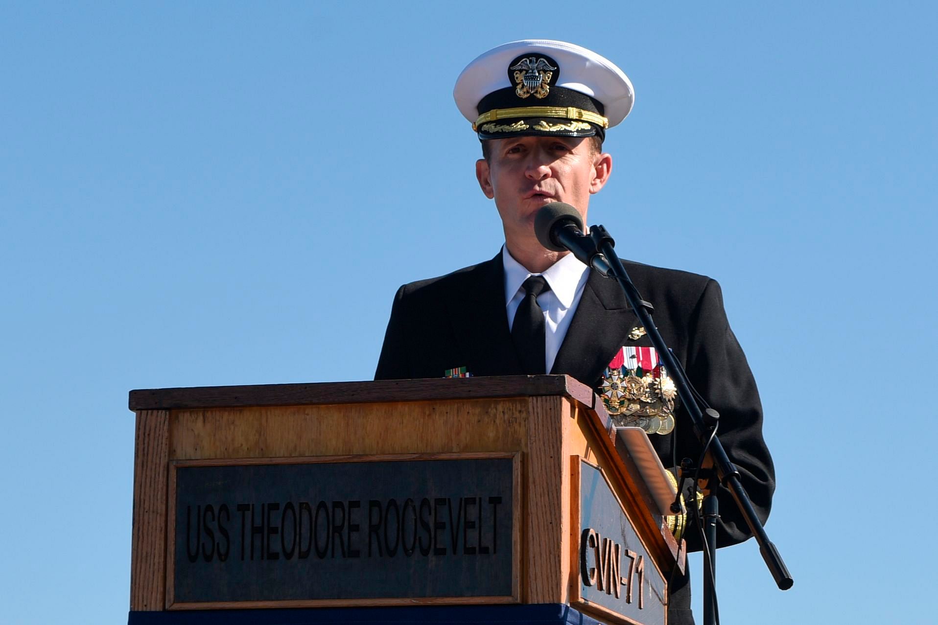 This handout photo released by the US Navy shows Captain Brett Crozier addressing the crew for the first time as commanding officer of the aircraft carrier 'USS Theodore Roosevelt'. Credit: AFP Photo