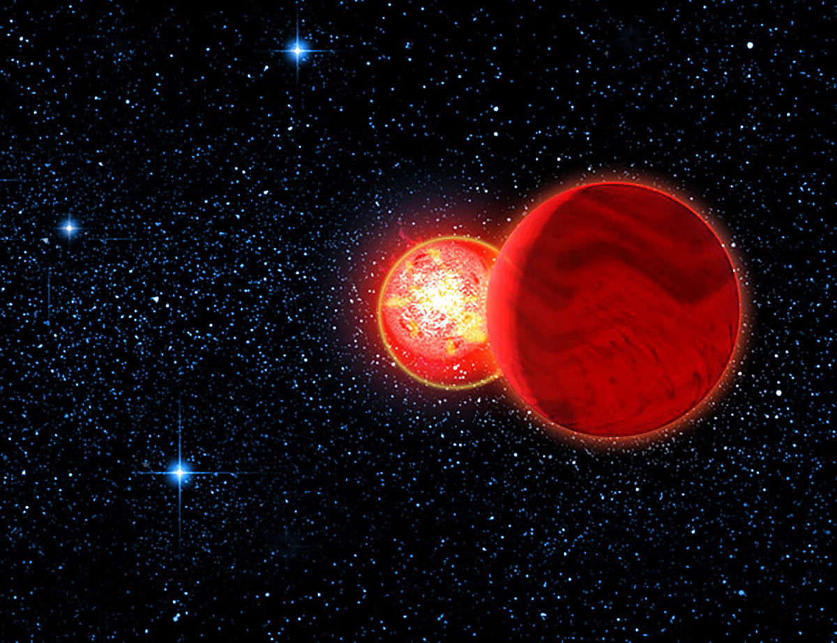 Two to tango: Simulated illustration of a red and brown dwarf binary system. 