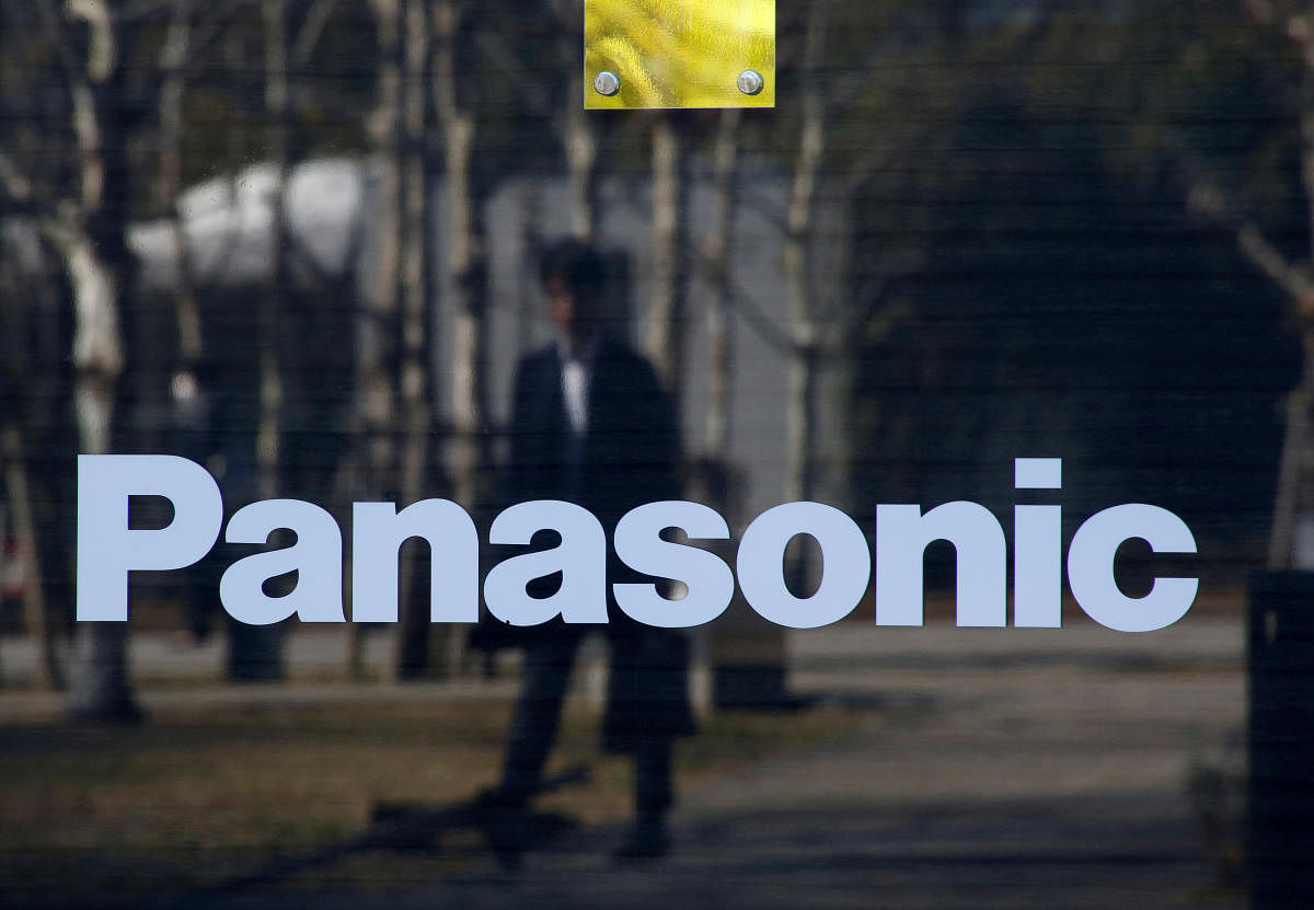 A man is reflected on Panasonic Corp's logo at Panasonic Center in Tokyo, Japan, February 2, 2017. (Reuters Photo)