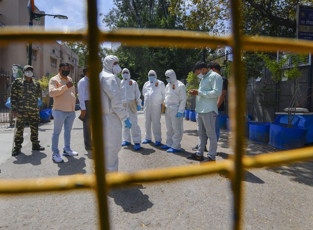 Norensic officials arrive at Nizamuddin Markaz to conduct an investigation, during the nationwide lockdown to curb the spread of coronavirus, in New Delhi, Sunday, April 5, 2020. Credit: PTI Photo