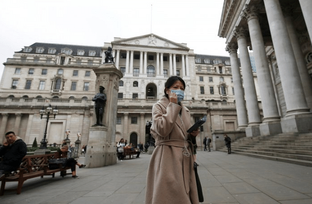 Represenational image-A woman is seen with a mask near the Bank of Engand in London. (Credit: Reuters) 