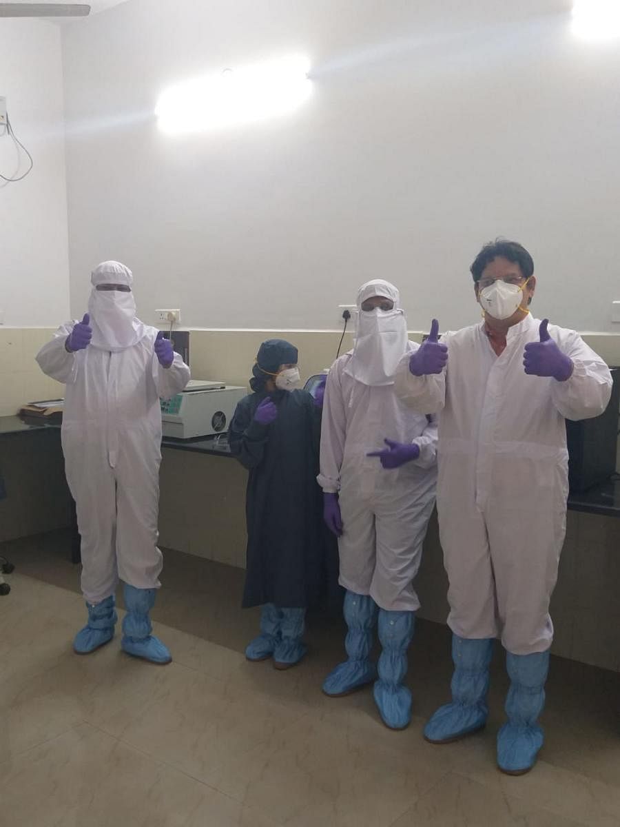 Staff at the virology lab of Wenlock Hospital in Mangaluru.