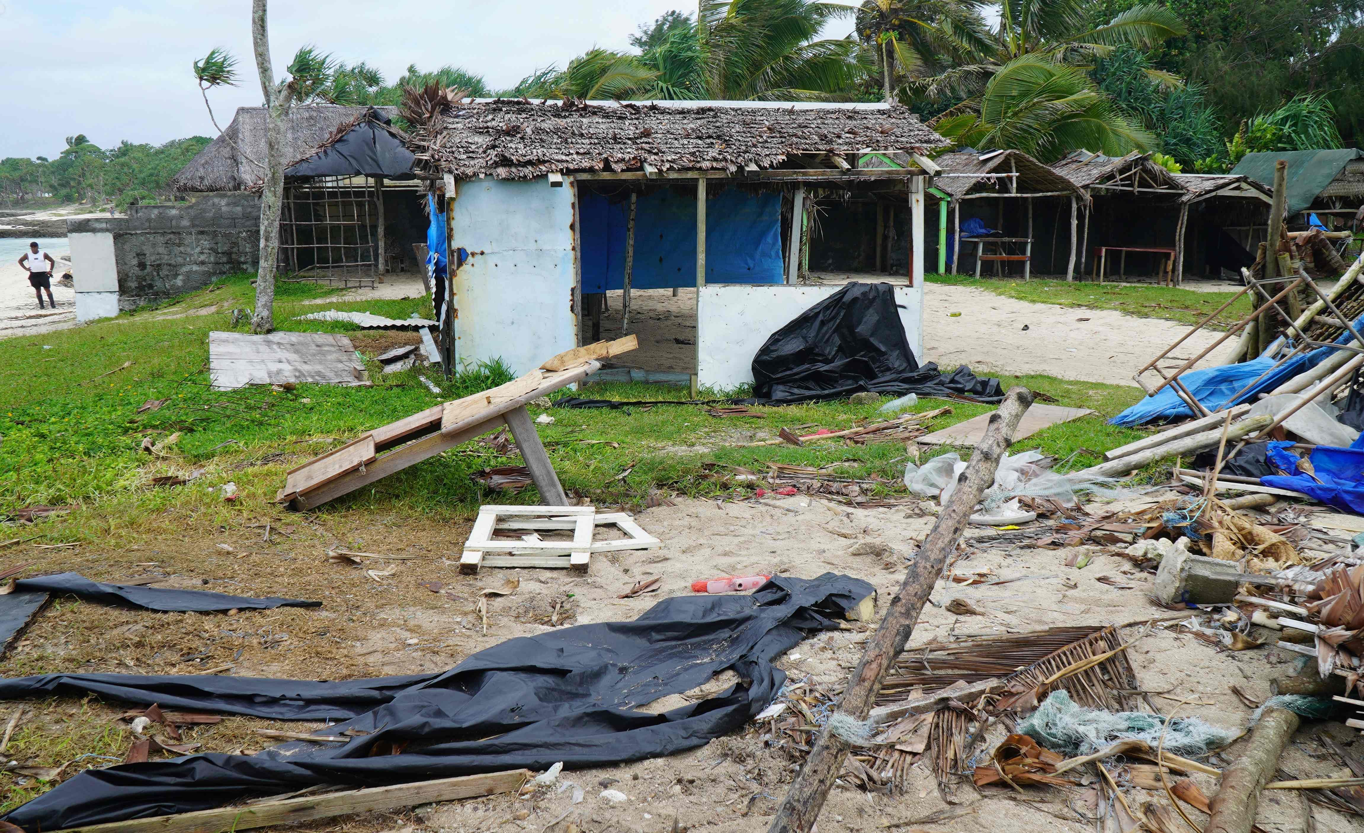 Flooded streets, wild winds and ruined buildings on the country's main island home to Suva featured in unverified video images and photographs circulated on social media. (Credit: AFP Photo)