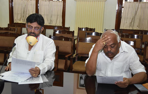 D K Shivakumar, Ramesh Kumare are seen at all party meeting discussion on prevention of Caronavirus, Covjd-19 lockdown, at Vidhana Soudha in Bengaluru. (Credit: DH Photo)
