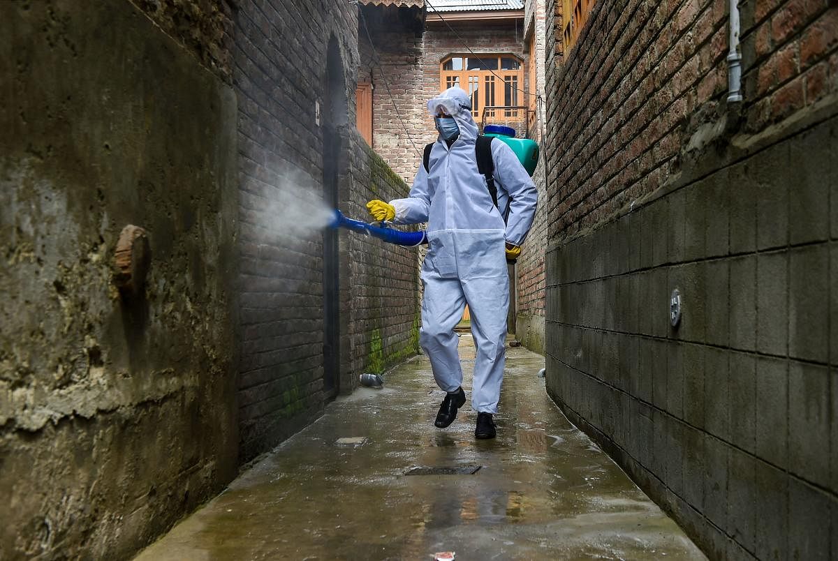 A special team sprays disinfectant in a locality after a positive case of coronavirus was reported (PTI Photo)