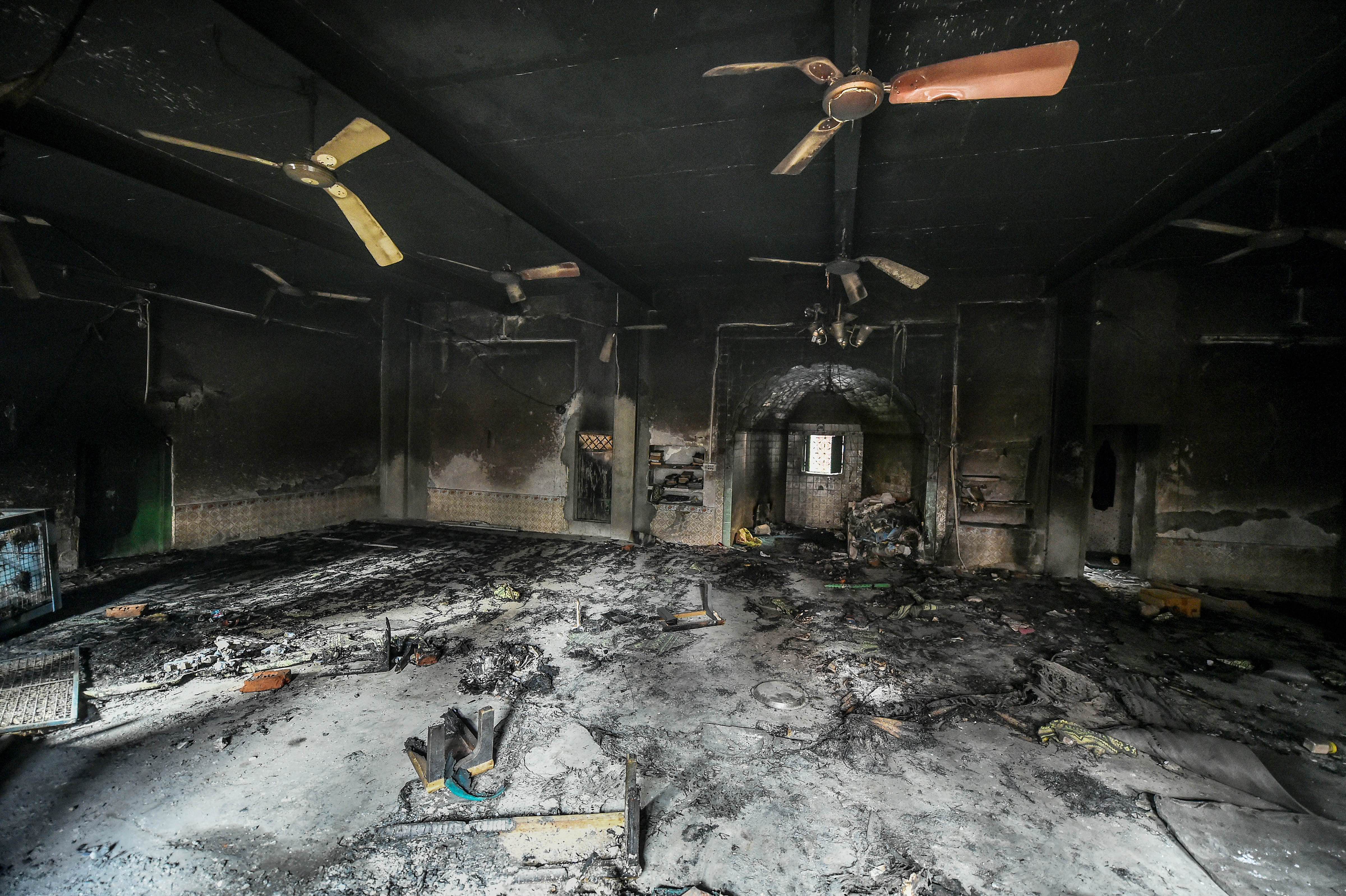 A burnt property following clashes over the new citizenship law, in Northeast Delhi. (Credit: PTI)