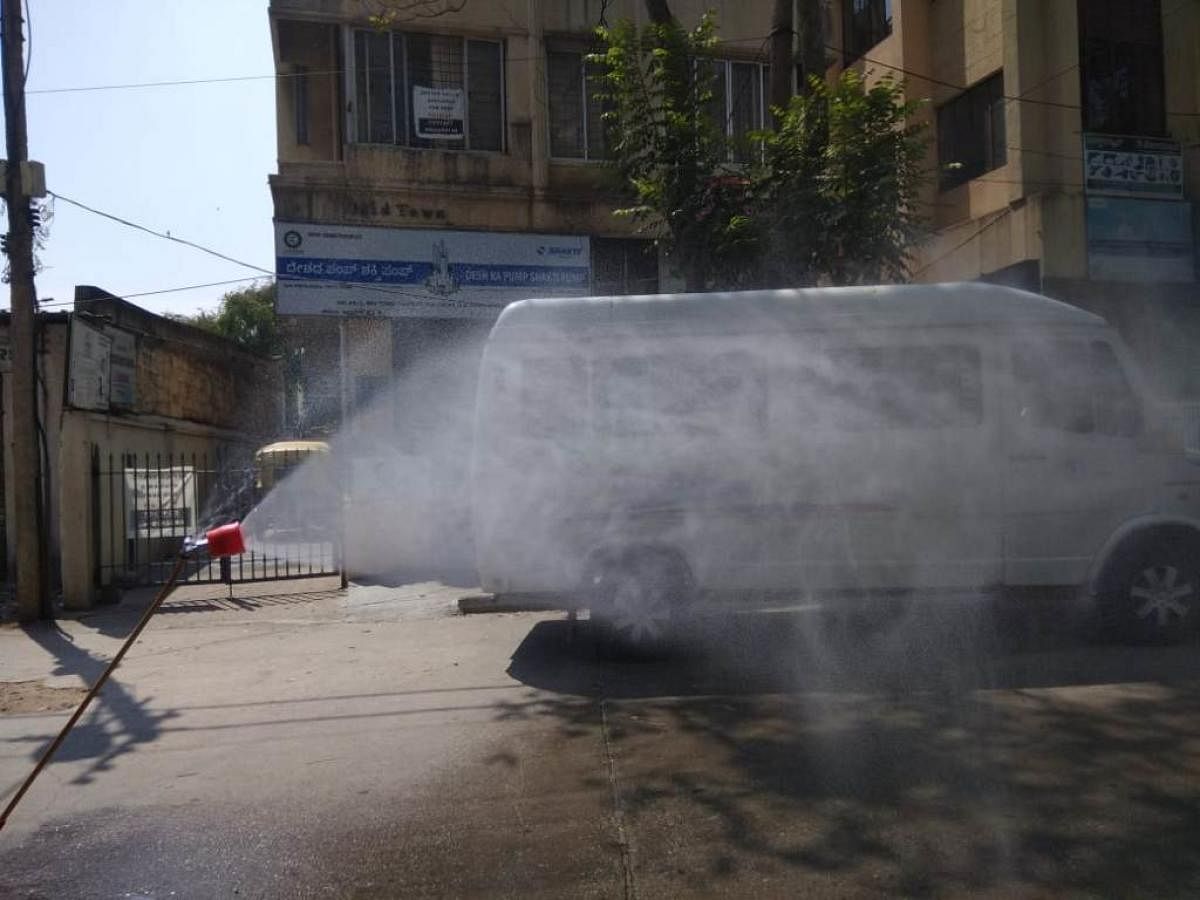 A disinfectant tunnel being set up at the entrance of the APMC in Tarikere.