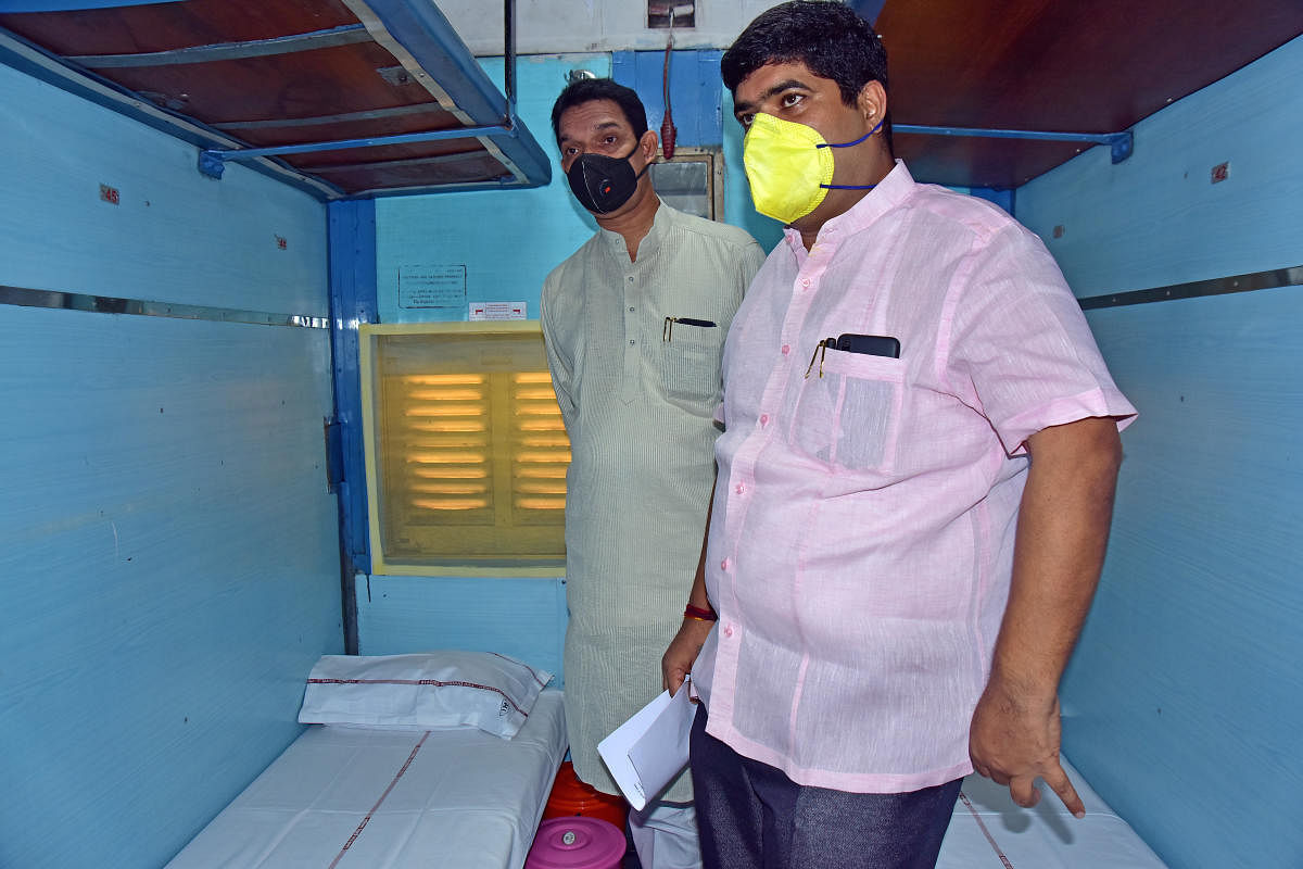 Dakshina Kannada MP Nalin Kumar Kateel and MLA D Vedavyasa Kamath inspect the railway bogies converted into isolation wards at Mangaluru Central Railway Station in Mangaluru on Sunday. DH Photo