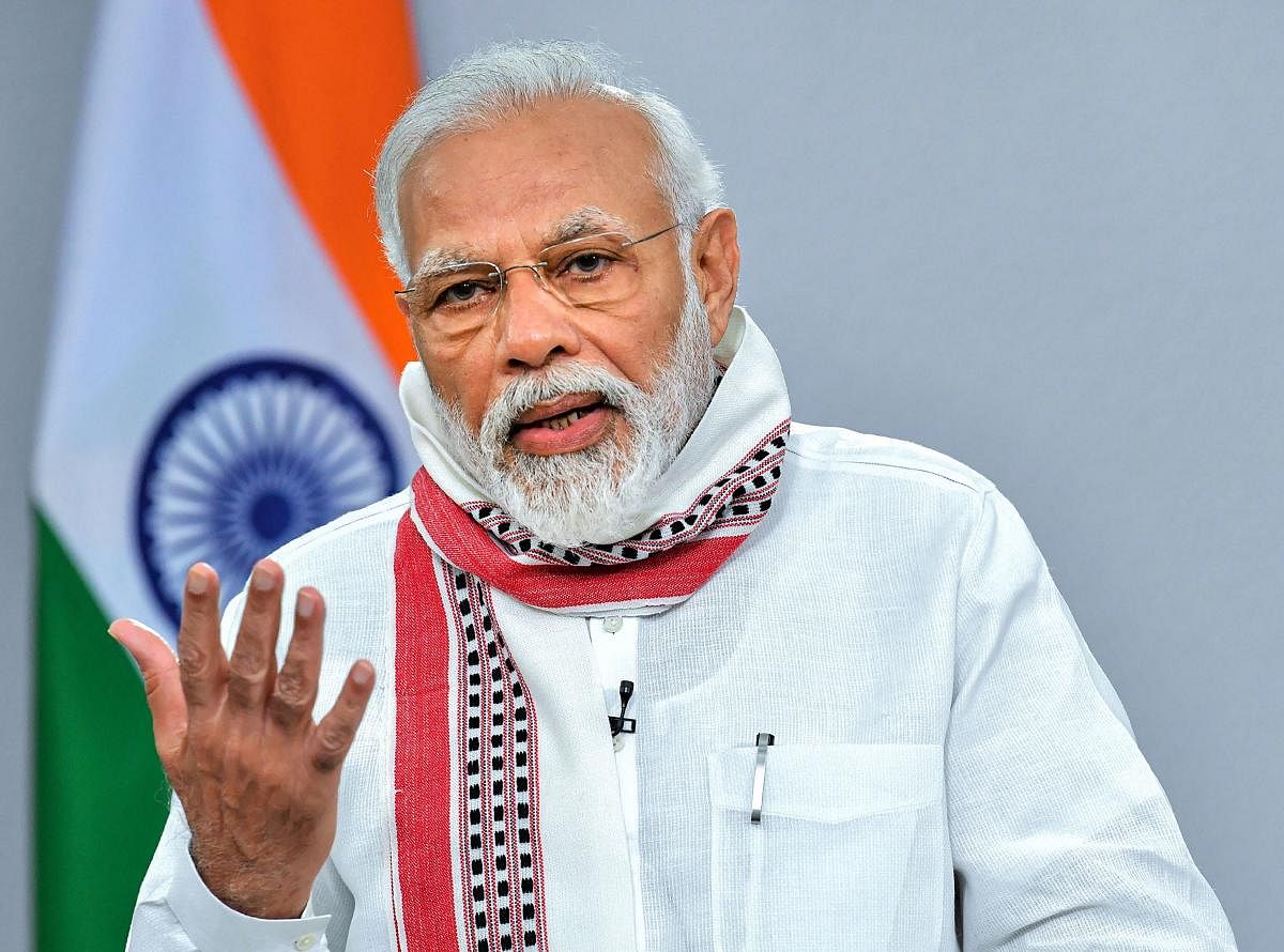 Prime Minister Narendra Modi addresses the nation on COVID-19 via a video link, in New Delhi, Tuesday, April 14, 2020. PM Modi announced extension of the ongoing lockdown till May 3.(PIB/PTI Photo)