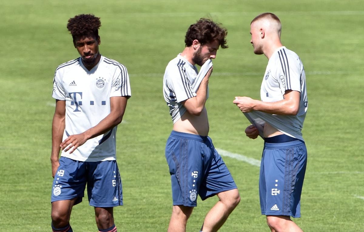 Kingsley Coman drove into training in a McLaren, violating a contract mandating him to drive an Audi. AFP photo