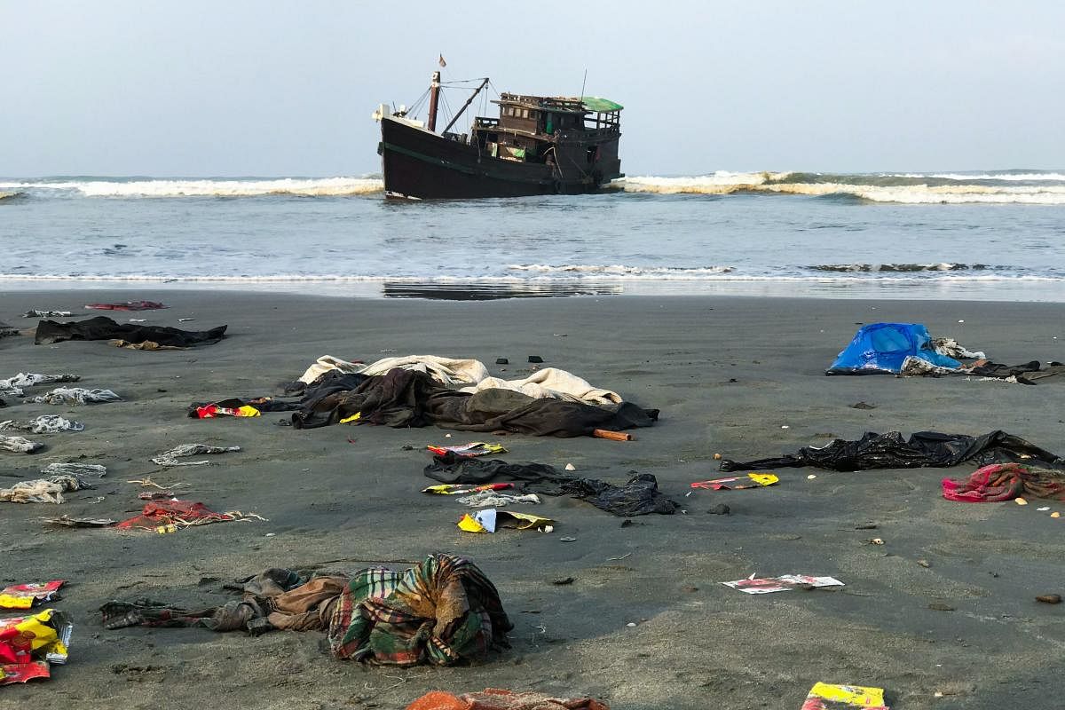 Belongings of Rohingya refugees lay on the shore (AFP Photo)