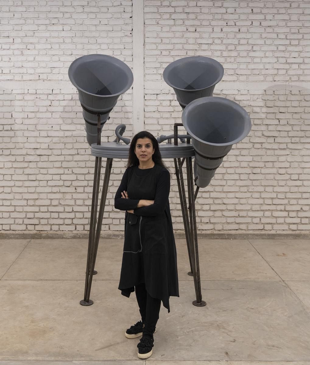 Reena Kallat with one of her sculptures at her solo show 'Blind Spots'.