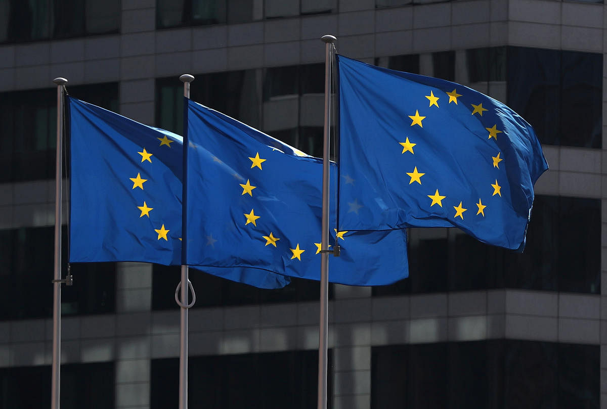 European Union flags fly outside the European Commission headquarters in Brussels, Belgium. Credit: Reuters Photo