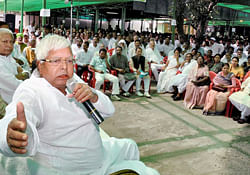 RJD chief Lalu Prasad holding a meeting with his party leaders in Patna on Saturday. PTI Photo