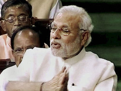 Prime Minister Narendra Modi replies during the discussion on President's address in Lok Sabha in New Delhi. PTI Photo