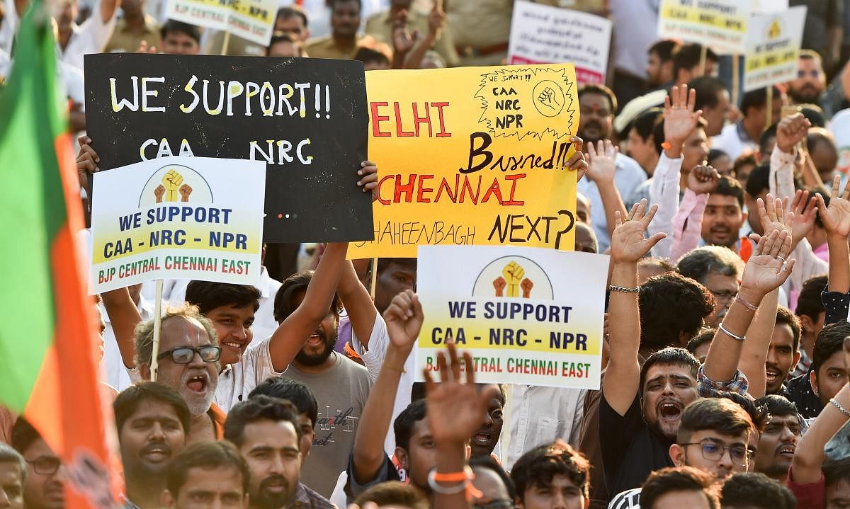  BJP workers hold placards during a rally in support of the Citizenship Amendment Act (CAA) (PTI Photo)