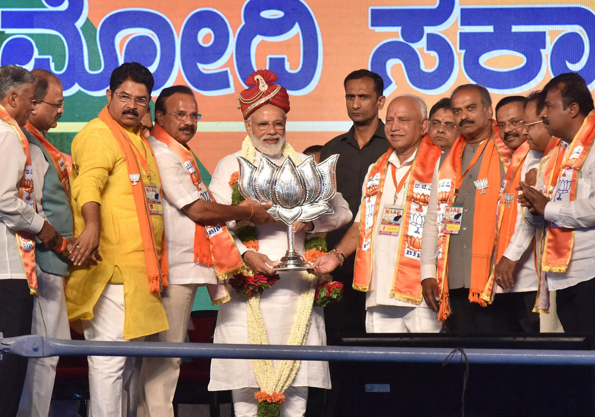 Prime Minister Narendra Modi during the public rally for Lok Sabha elections at Palace Ground in Bengaluru. (DH Photo)