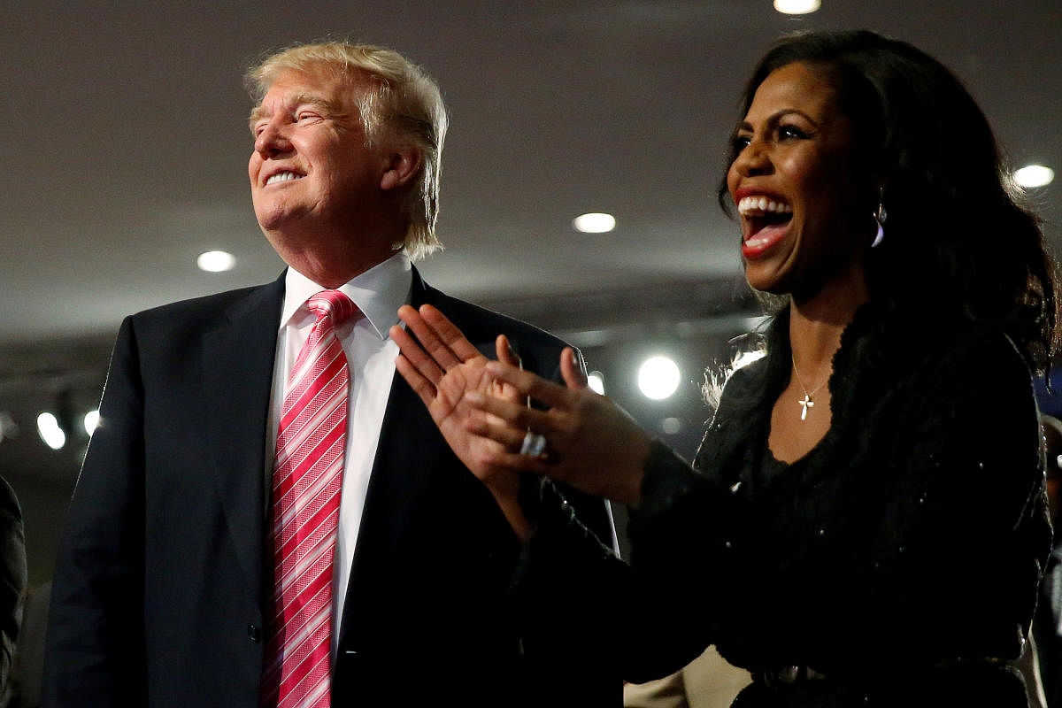 Donald Trump and Omarosa Manigault attend a church service in Detroit on September 3, 2016. Reuters