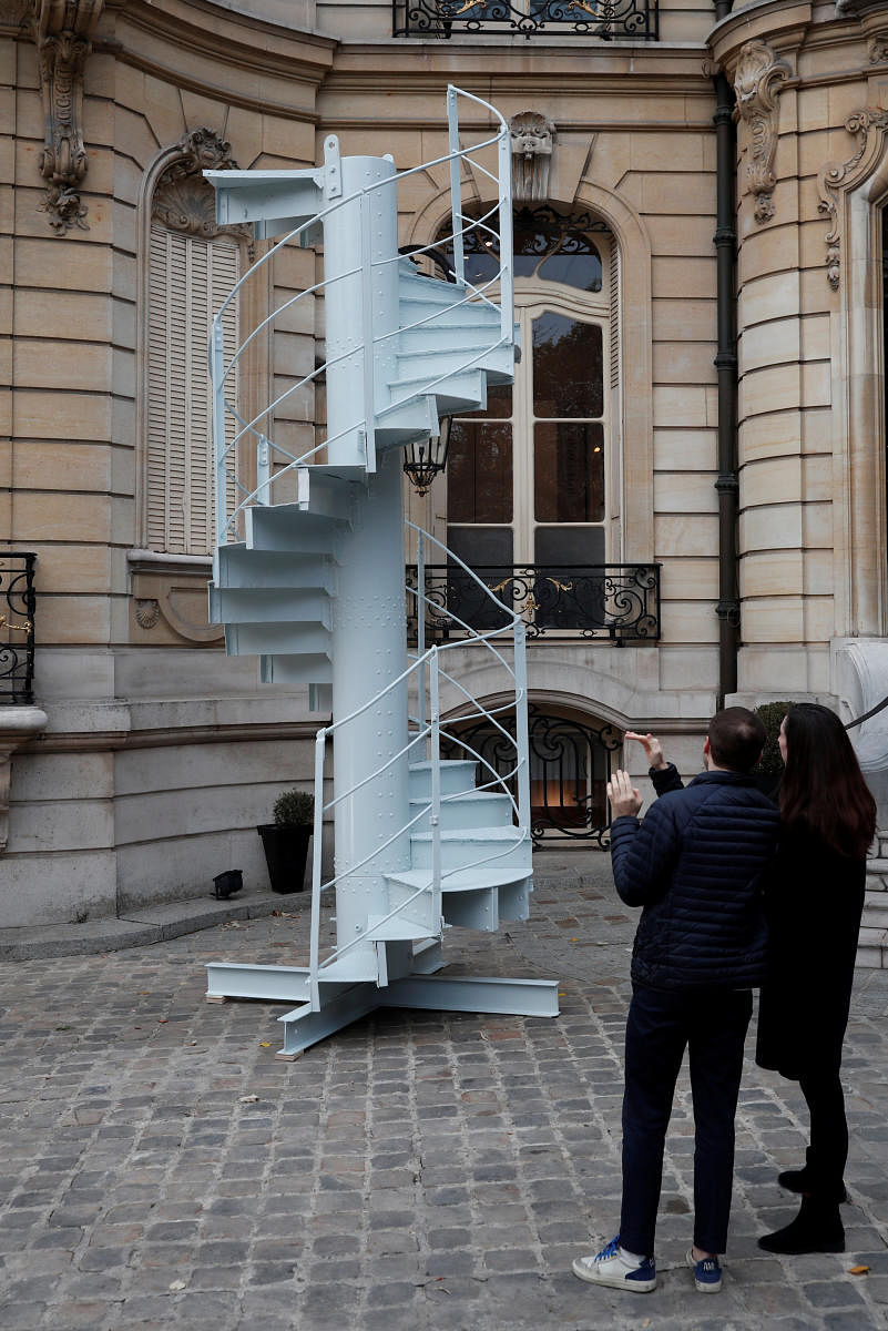 A portion of the original staircase of the Eiffel Tower constructed by Gustave Eiffel in 1889 is displayed during a press preview ahead of its upcoming auction organized by Artcurial in Paris, France, November 8, 2018. Reuters