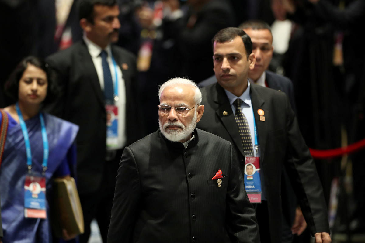 India's Prime Minister Narendra Modi arrives for a special lunch on sustainable development on the sidelines of the ASEAN summit in Bangkok, Thailand, November 4, 2019. (Photo by Reuters)