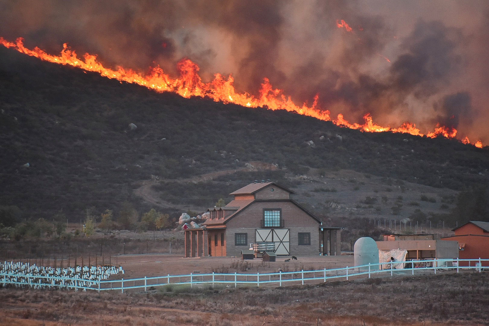 A fire burns in Valle de Guadalupe, Baja California, Mexico October 25, 2019 in this picture obtained from social media. (Reuters Photo)