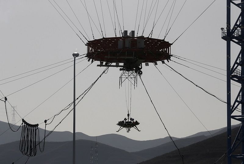 A lander for China's Mars mission is seen after a hovering-and-obstacle avoidance test at a test facility in Huailai, Hebei province, China. (Reuters Photo)
