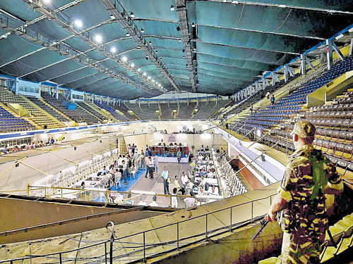 on the vigil: Security personnel deployed at the Netaji Indore Stadium counting centre on the eve of the results of the West Bengal Assembly elections in Kolkata on Wednesday. PTI