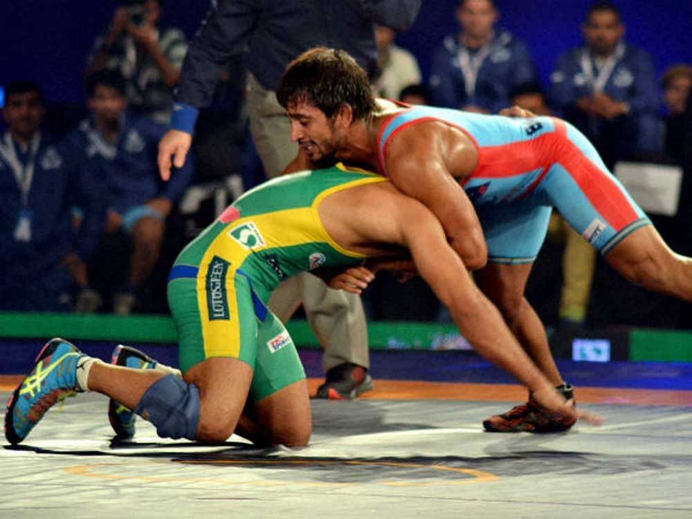 Punia lost to rival athlete Mustafa Kaya of Turkey 3-8, sealing his and India's fate at the World Wrestling Championships. PTI file photo.