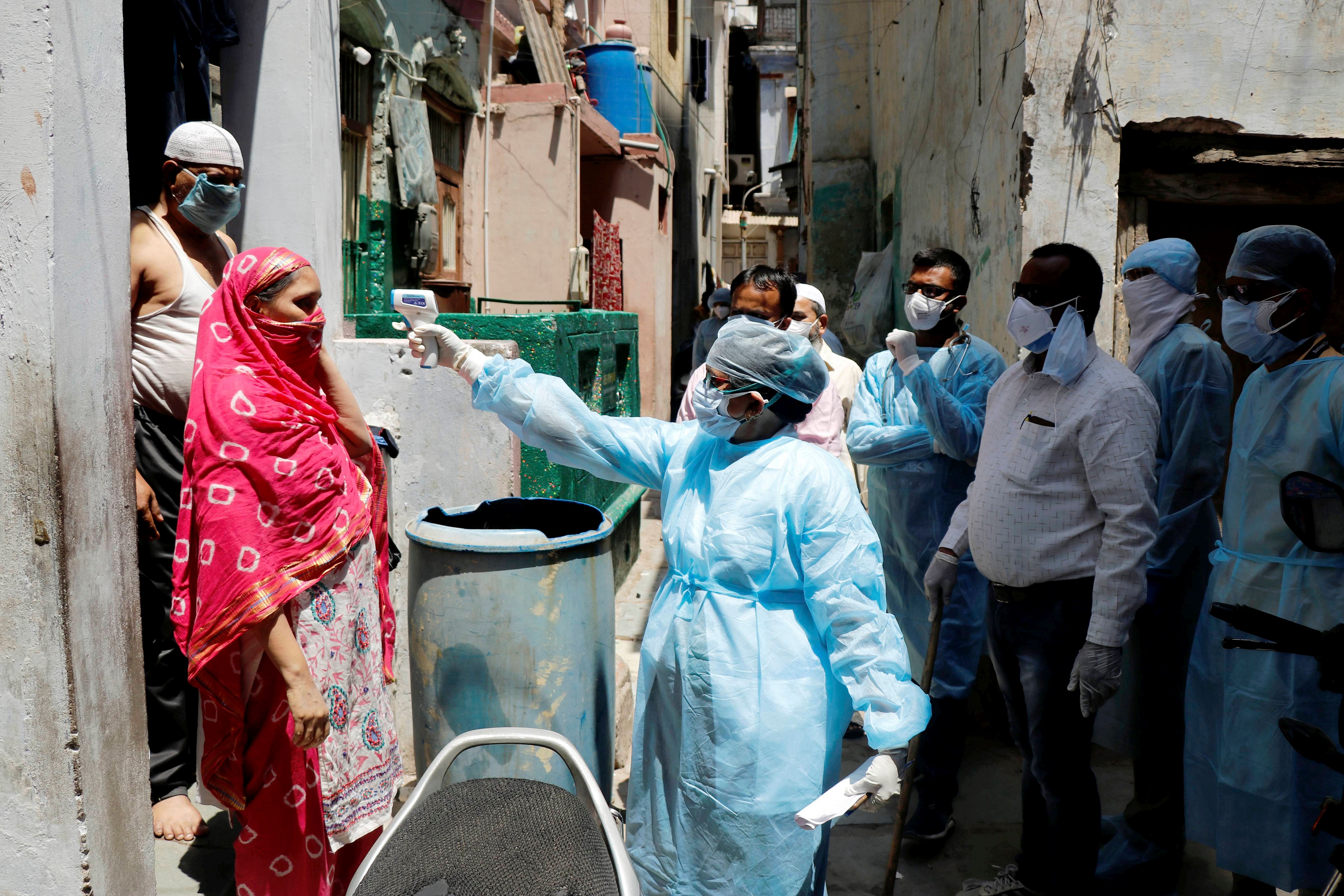  A medical team conducts door-to-door survey to screen people for COVID 19 symptoms, during the nationwide lockdown imposed in wake of the coronavirus outbreak. (PTI Photo)