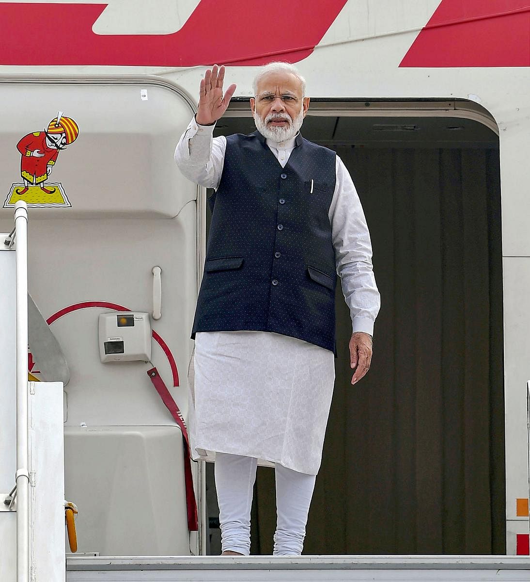 Prime Minister Narendra Modi emplanes for Brazil to take part in BRICS Summit, in New Delhi, Tuesday, Nov. 12, 2019. (PIB/PTI Photo)