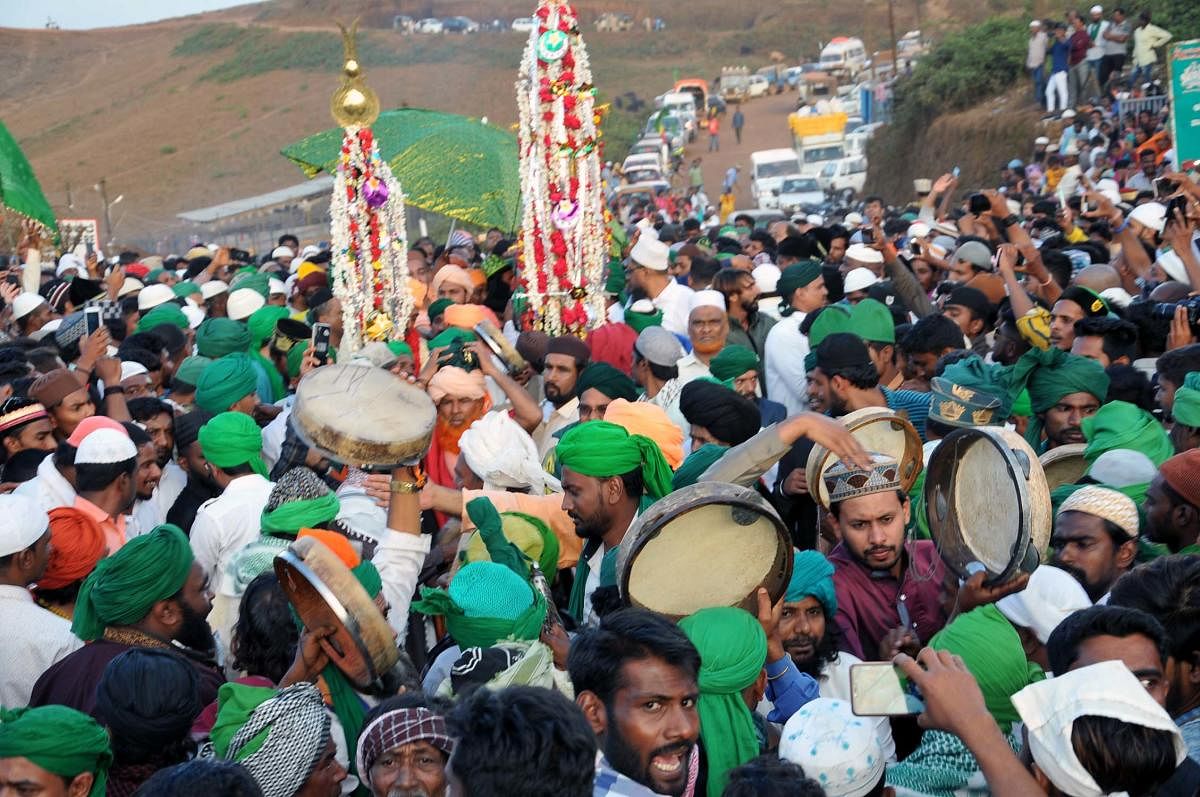 Devotees in front of Sri Gurudattatreya Bababudan Swamy Dargah in Chikkamagaluru.