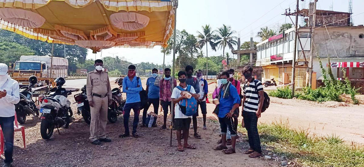 Labourers on their way to Haveri on foot were stopped at Hejamady checkpost.