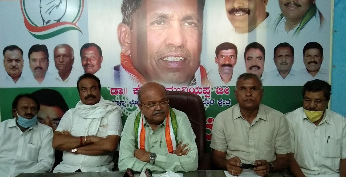 Congress party Covid-19 task force Bengaluru division president H M Revanna speaks at the district task force meeting in Kolar on Monday.