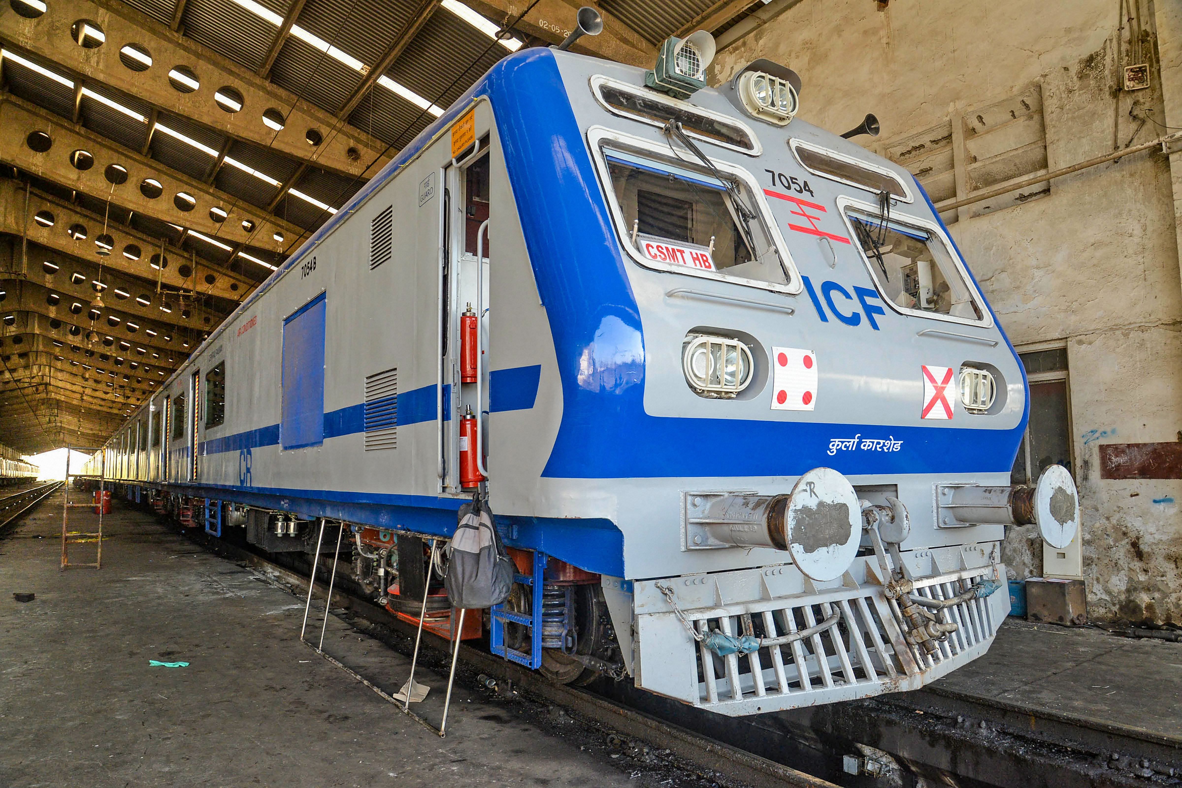 First AC train on Central Railway's trans-harbour corridor between Thane and Panvel is stationed at Sanpada car shed ahead of its trial run, in Navi Mumbai. (PTI Photo)
