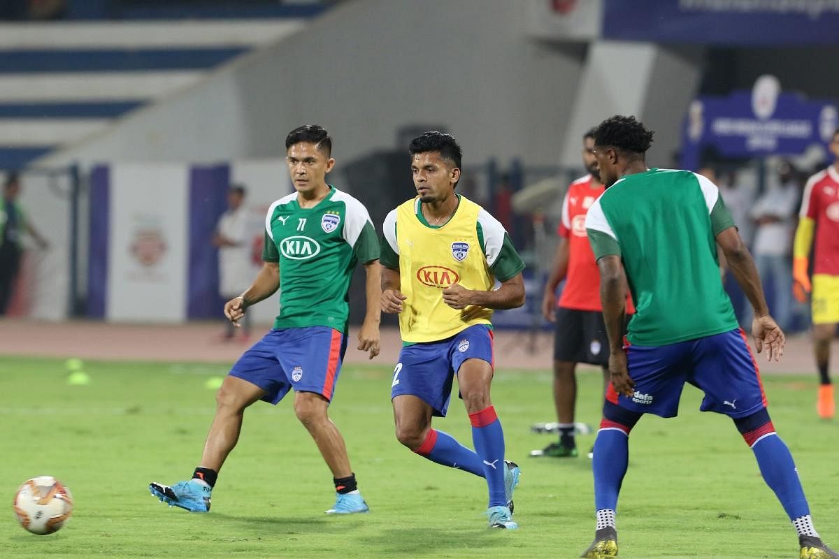 Bengaluru FC will hope captain Sunil Chhetri (left) will come to life against ATK on Sunday.