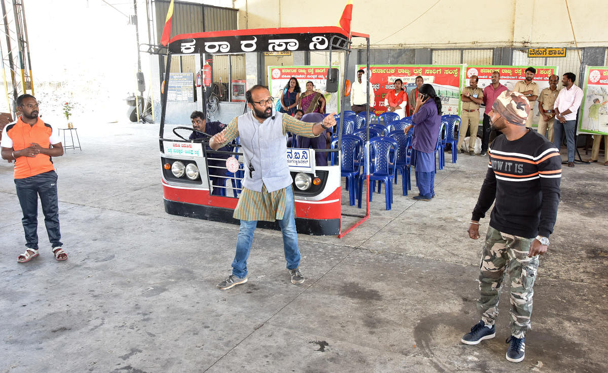 A team of KSRTC employees, KSRTC Samskruthika Kalakutira, enact a streetplay at a depot in Mysuru, recently. dh photo