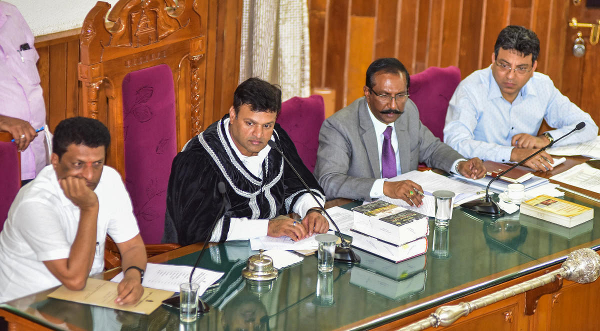 (L-R) Deputy mayor C R Ramamohan Raju, Mayor M Goutham Kumar, BBMP commissioner B H Anil Kumar and BWSSB chairman Tushar Girinath during the council meeting on Saturday. DH Photo/S K Dinesh