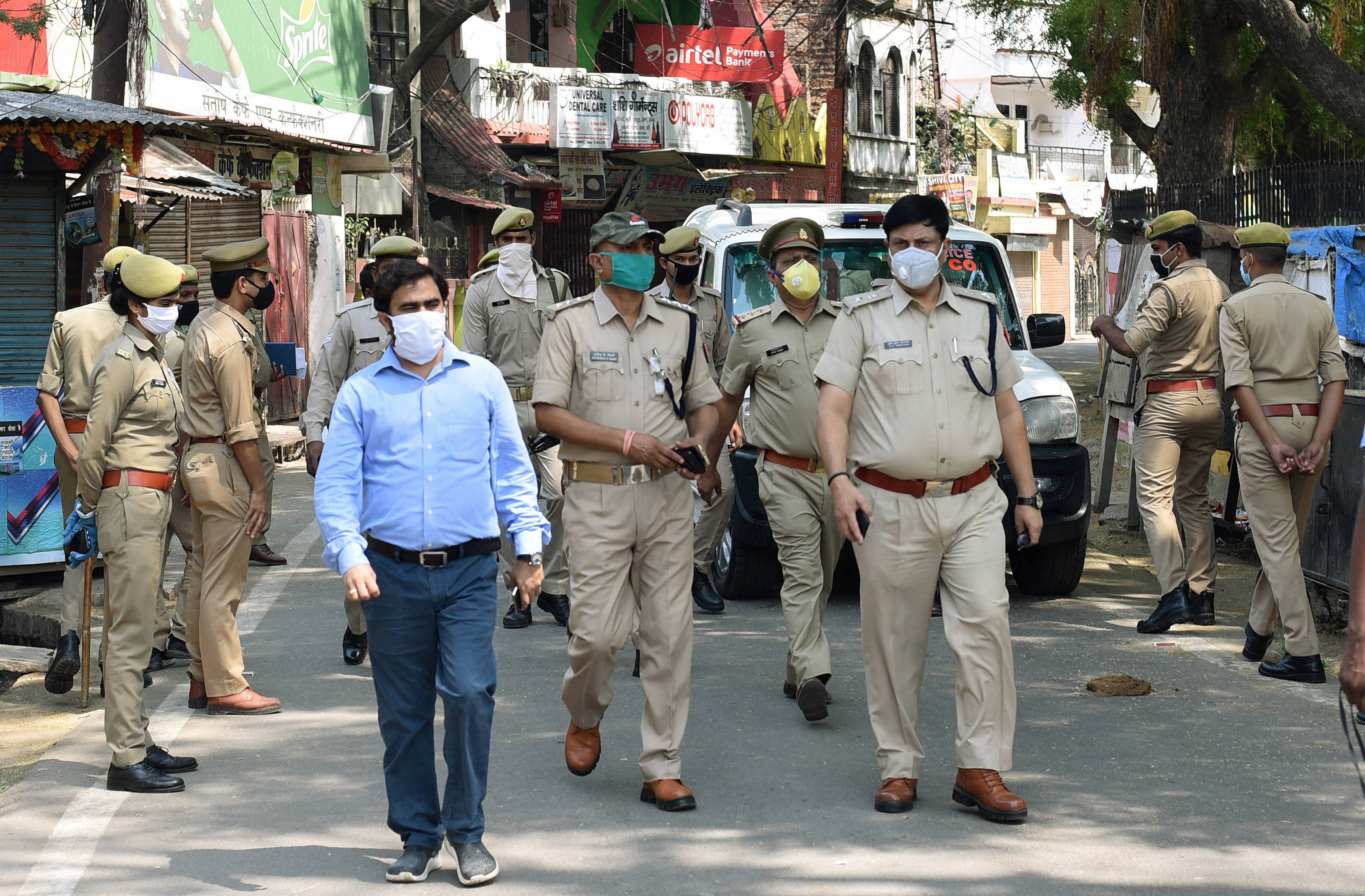 Police personnel patrol in Telierganj area, identified as a COVID-19 hotspot, during the nationwide lockdown to curb the spread of coronavirus. (PTI Photo)