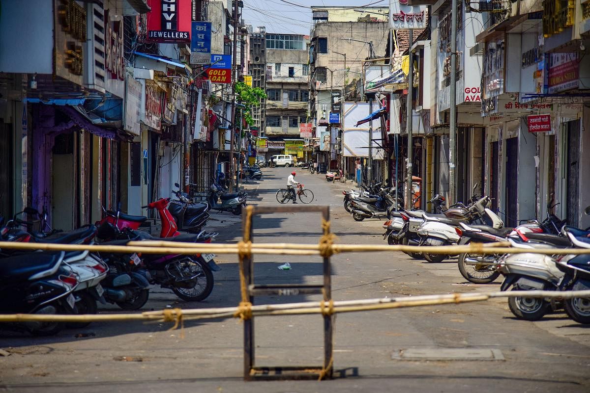 Barricades are seen at Khadki Cantonment after seven family members of a COVID-19 positive patient tested positive for the coronavirus infection during a nationwide lockdown in the wake of coronavirus pandemic, in Pune, Saturday, April 18, 2020. (PTI Photo)
