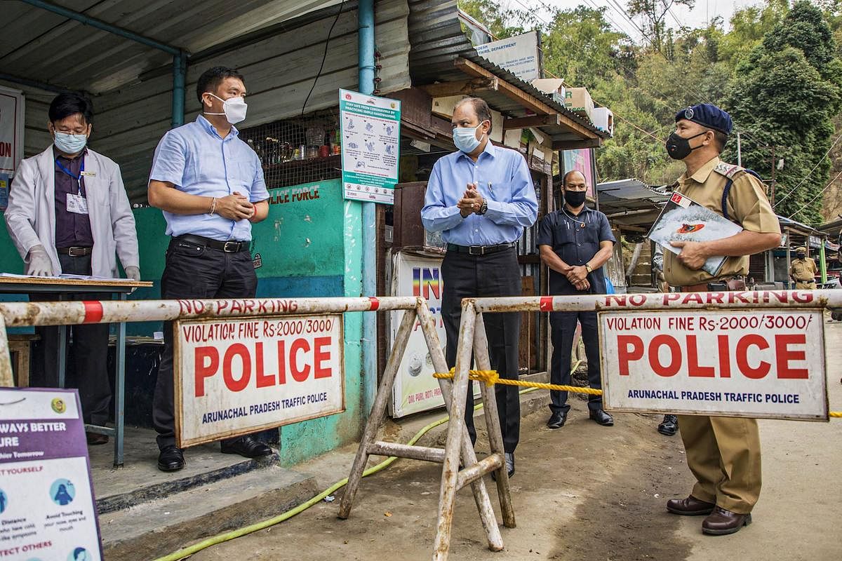  Arunachal Pradesh Chief Minister Pema Khandu carries out spot verification at Banderdewa check gate in Arunachal-Assam border to ensure that all points of entry into the state are fully equipped to detect any COVID-19 suspected cases, Saturday, April 18, 2020 (PTI Photo)