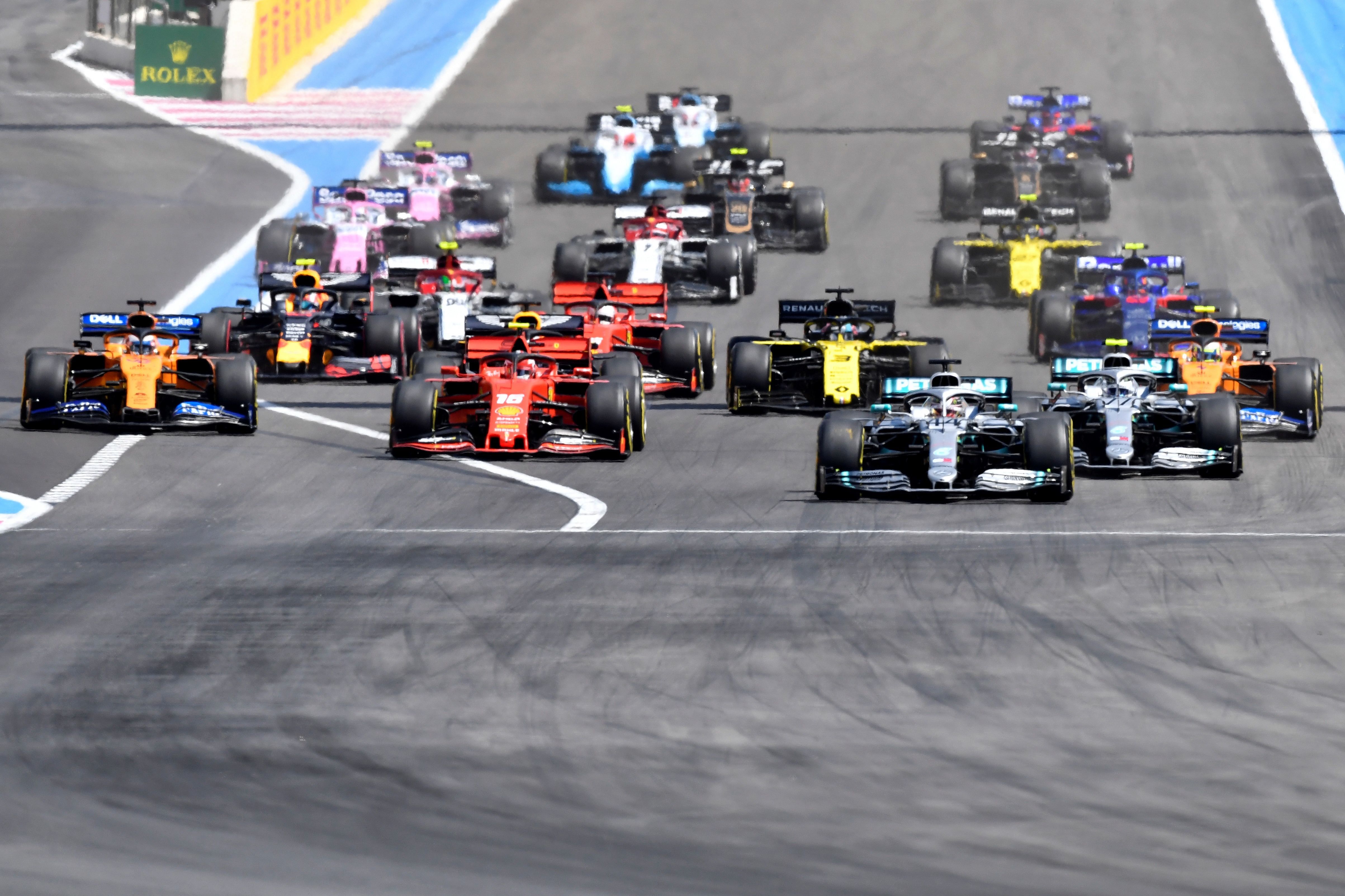 In this file photo taken on June 23, 2019 drivers take the start of the Formula One Grand Prix de France at the Circuit Paul Ricard in Le Castellet, southern France. (AFP)