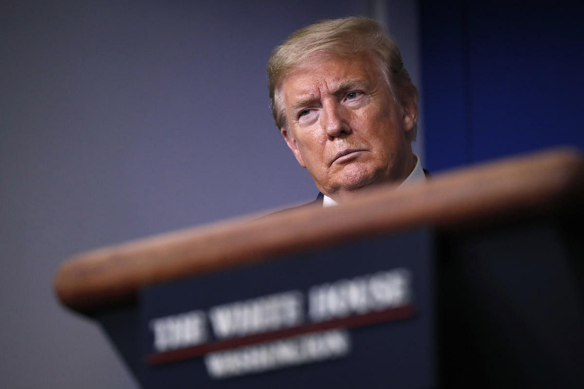 President Donald Trump listens during a briefing about the coronavirus in the James Brady Press Briefing Room of the White House, in Washington. Credit: AP Photo