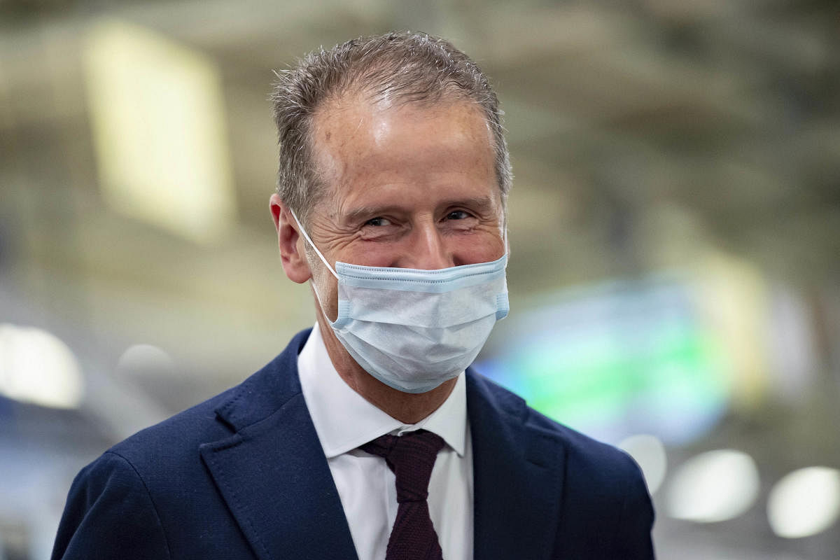 Volkswagen CEO Herbert Diess wears a face mask in the VW headquarters production plant in Wolfsburg. AP/PTI